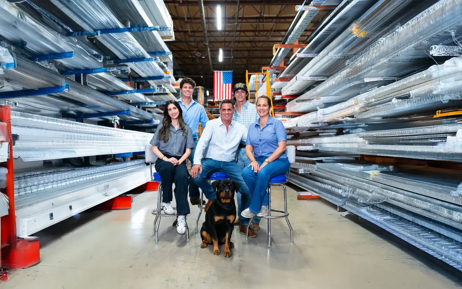 The Classic Metals family inside the aluminum warehouse